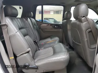 2003 GMC Envoy SLT с VIN 1GKET16S736148082, выставлен на аукционе Copart как лот 53889665 с пробегом 179 774 миль миль и Чистый • Clean title. История ставок и продаж доступна на DreamBid. Изображение 11.