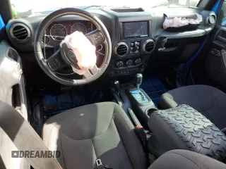2015 Jeep Wrangler Unlimited Sport with VIN 1C4BJWDG1FL683558, listed as a Copart auction lot 59883545 with 107,267 mi miles and Salvage title. Bid and sale history available at DreamBid. Image 8.