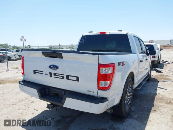 2023 Ford F-150 XL with VIN 1FTEW1CP5PKF42521, listed as a IAAI auction lot 42257062 with 30,758 mi miles and . Bid and sale history available at DreamBid. Image 4.
