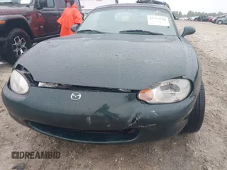 1999 Mazda MX-5 Miata with VIN JM1NB3539X0123231, listed as a IAAI auction lot 42314156 with 154,755 mi miles and . Bid and sale history available at DreamBid. Image 6.