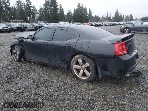 2006 Dodge Charger SRT-8 with VIN 2B3LA73W76H512508, listed as a Copart auction lot 86312114 with 177,592 mi miles and Salvage Title. Bid and sale history available at DreamBid. Image 2.