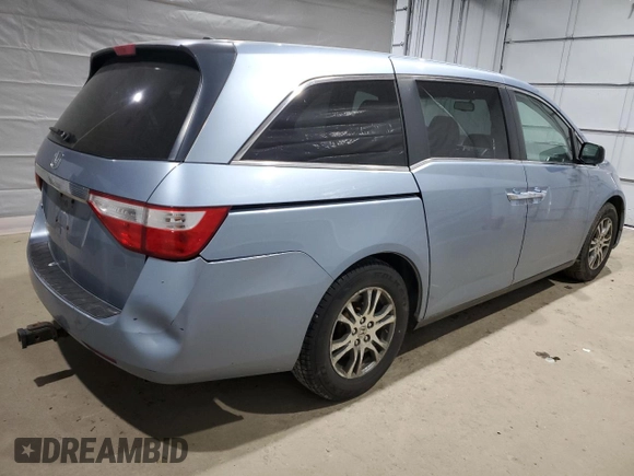 2013 Honda Odyssey EX-L with VIN 5FNRL5H68DB059146, listed as a Copart auction lot 47190105 with 200,378 mi miles and Salvage Title. Bid and sale history available at DreamBid. Image 3.