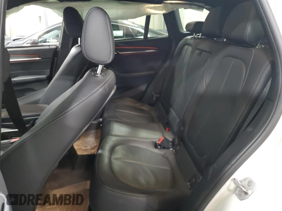 2017 BMW X1 xDrive28i with VIN WBXHT3Z38H4A53824, listed as a Copart auction lot 52500215 with 106,782 mi miles and Salvage title. Bid and sale history available at DreamBid. Image 12.