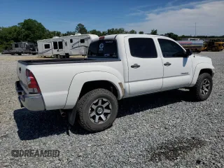 2015 Toyota Tacoma PreRunner with VIN 3TMJU4GNXFM180210, listed as a Copart auction lot 58169015 with 153,037 mi miles and Salvage title. Bid and sale history available at DreamBid. Image 3.