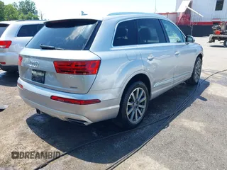 2018 Audi Q7 Premium Plus with VIN WA1LHAF74JD015170, listed as a IAAI auction lot 42542451 with 104,990 mi miles and . Bid and sale history available at DreamBid. Image 4.