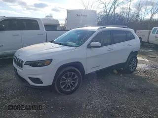 2019 Jeep Cherokee Altitude with VIN 1C4PJLLX0KD383858, listed as a IAAI auction lot 41414144 with 78,013 mi miles. Bid and sale history available at carsss.com. Image 2.