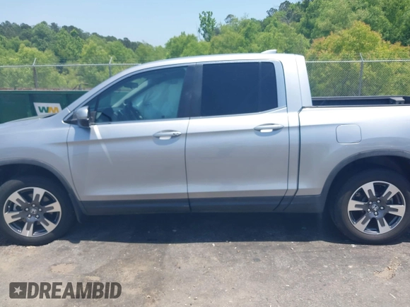 2018 Honda Ridgeline RTL z VIN 5FPYK2F5XJB001064, wystawiony jako IAAI lot #42252956 z przebiegiem 95 272 mil mil oraz . Historia ofert i sprzedaży dostępna na DreamBid. Obrazek 15.