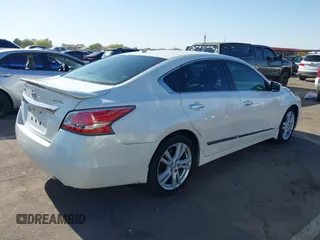 2014 Nissan Altima SL with VIN 1N4BL3AP4EC267165, listed as a IAAI auction lot 42046064 with 154,758 mi miles and . Bid and sale history available at DreamBid. Image 4.