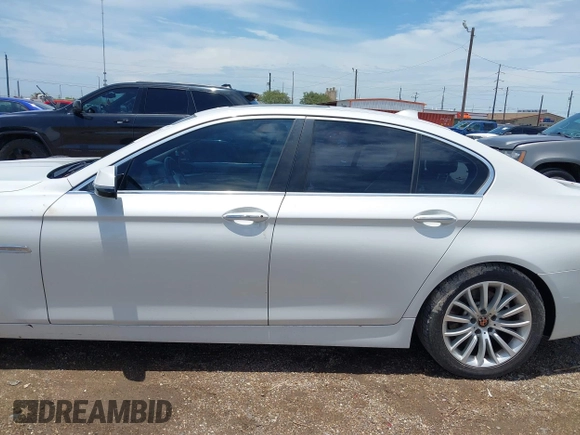 2014 BMW 5 Series 528i z VIN WBA5A5C5XED501949, wystawiony jako IAAI lot #42487130 z przebiegiem 142 445 mil mil oraz . Historia ofert i sprzedaży dostępna na DreamBid. Obrazek 14.