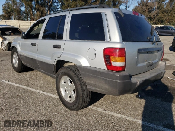 2003 Jeep Grand Cherokee Laredo with VIN 1J4GX48S63C523513, listed as a Copart auction lot 50001005 with 0 mi miles and Salvage Title. Bid and sale history available at carsss.com. Image 2.