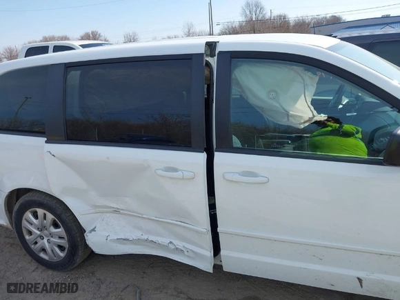 2016 Dodge Grand Caravan American Value Pkg with VIN 2C4RDGBG8GR284928, listed as a IAAI auction lot 41742483 with 96,909 mi miles. Bid and sale history available at carsss.com. Image 13.