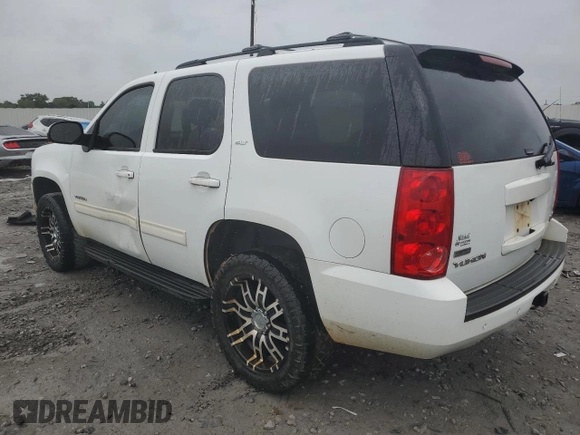 2011 GMC Yukon SLT with VIN 1GKS1CE09BR154032, listed as a Copart auction lot 69023864 with 246,494 mi miles and Salvage Title. Bid and sale history available at carsss.com. Image 2.