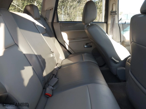 2009 Jeep Grand Cherokee Laredo with VIN 1J8GS48K79C516320, listed as a IAAI auction lot 41353131 with 166,739 mi miles. Bid and sale history available at carsss.com. Image 8.