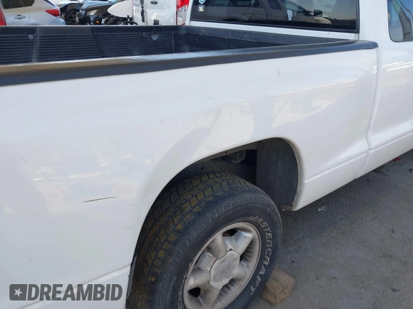 1997 Dodge Dakota with VIN 1B7GL23X2VS239975, listed as a IAAI auction lot 41831896 with 382,978 mi miles. Bid and sale history available at carsss.com. Image 18.