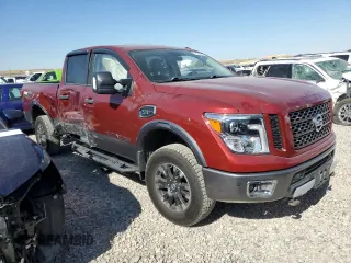 2017 Nissan Titan XD PRO-4X with VIN 1N6AA1F46HN529031, listed as a Copart auction lot 74314094 with 0 mi miles and Salvage Title. Bid and sale history available at carsss.com. Image 4.