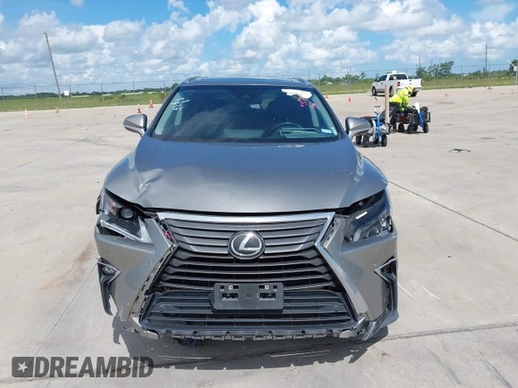 2018 Lexus RX 350 z VIN 2T2ZZMCAXJC110162, wystawiony jako IAAI lot #42608568 z przebiegiem 70 231 mil mil oraz . Historia ofert i sprzedaży dostępna na DreamBid. Obrazek 12.