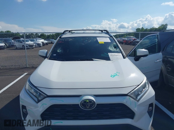 2020 Toyota RAV4 XLE with VIN 2T3W1RFV2LW068363, listed as a IAAI auction lot 42456921 with 125,014 mi miles and . Bid and sale history available at DreamBid. Image 6.
