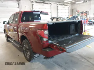 2021 Nissan Titan Pro-4X with VIN 1N6AA1ED9MN525986, listed as a IAAI auction lot 41795296 with 34,395 mi miles and . Bid and sale history available at DreamBid. Image 3.