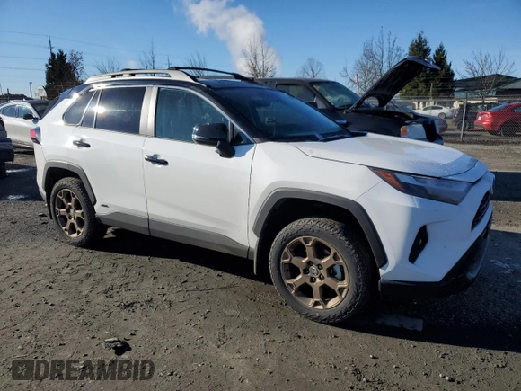 2024 Toyota RAV4 Hybrid LE with VIN 2T3UWRFVXRW229883, listed as a Copart auction lot 89095515 with 6,501 mi miles and Salvage title. Bid and sale history available at DreamBid. Image 4.
