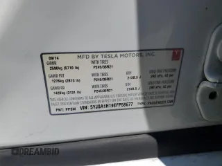 2014 Tesla Model S 60 with VIN 5YJSA1H19EFP58677, listed as a Copart auction lot 61446345 with 150,152 mi miles and Salvage title. Bid and sale history available at DreamBid. Image 13.
