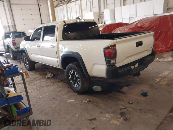 2021 Toyota Tacoma SR z VIN 5TFCZ5AN1MX268370, wystawiony jako IAAI lot #41922632 z przebiegiem 50 358 mil mil oraz . Historia ofert i sprzedaży dostępna na DreamBid. Obrazek 3.