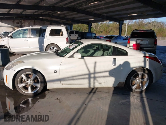 2006 Nissan 350Z Touring z VIN JN1AZ34D86M307042, wystawiony jako IAAI lot #41016528 z przebiegiem 124 303 mil mil oraz . Historia ofert i sprzedaży dostępna na DreamBid. Obrazek 14.
