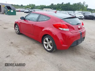 2013 Hyundai Veloster w/Gray Int with VIN KMHTC6AD0DU145090, listed as a IAAI auction lot 42618390 with 126,641 mi miles and . Bid and sale history available at DreamBid. Image 3.