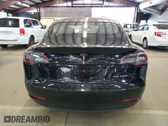 2018 Tesla Model 3 Long Range Battery z VIN 5YJ3E1EB4JF144295, wystawiony jako Copart lot #58754715 z przebiegiem 63 569 mil mil oraz Tytuł czysty. Historia ofert i sprzedaży dostępna na DreamBid. Obrazek 6.