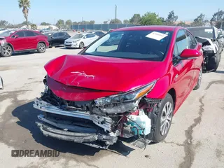 2020 Toyota Prius LE with VIN JTDKARFP8L3154280, listed as a IAAI auction lot 42405444 with 57,134 mi miles and . Bid and sale history available at DreamBid. Image 18.