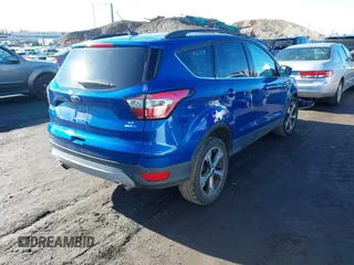 2017 Ford Escape SE with VIN 1FMCU9G91HUE28282, listed as a IAAI auction lot 41471957 with 23,552 mi miles. Bid and sale history available at carsss.com. Image 4.
