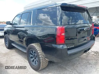 2018 Chevrolet Tahoe LT with VIN 1GNSCBKC9JR133640, listed as a IAAI auction lot 42542381 with 130,154 mi miles and . Bid and sale history available at DreamBid. Image 3.