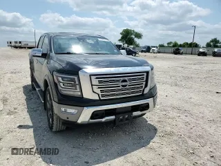 2023 Nissan Titan Platinum Reserve with VIN 1N6AA1EDXPN106467, listed as a Copart auction lot 53455215 with 56,061 mi miles and Salvage title. Bid and sale history available at DreamBid. Image 10.