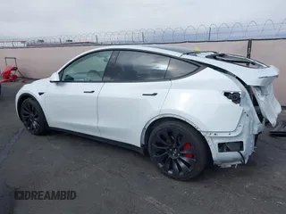2023 Tesla Model Y Performance with VIN 7SAYGDEFXPF589477, listed as a IAAI auction lot 41936981 with 28,993 mi miles and . Bid and sale history available at DreamBid. Image 20.