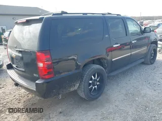 2011 Chevrolet Suburban LTZ with VIN 1GNSKKE39BR303754, listed as a IAAI auction lot 42070374 with 207,824 mi miles and . Bid and sale history available at DreamBid. Image 4.