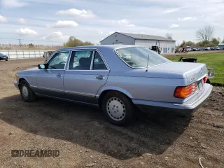 1991 Mercedes-Benz 420 with VIN WDBCA35E7MA572309, listed as a Copart auction lot 52513524 with 92,991 mi miles and Salvage Title. Bid and sale history available at carsss.com. Image 2.