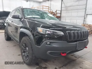 2019 Jeep Cherokee Trailhawk with VIN 1C4PJMBX9KD456748, listed as a IAAI auction lot 42367186 with 91,665 mi miles and . Bid and sale history available at DreamBid. Image 1.