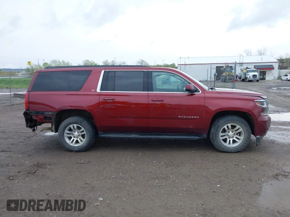 2020 Chevrolet Suburban LT with VIN 1GNSKHKC9LR233603, listed as a IAAI auction lot 41311582 with 104,754 mi miles. Bid and sale history available at carsss.com. Image 13.