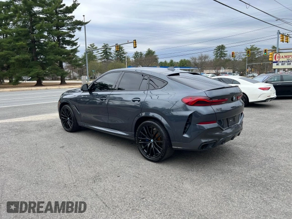 2021 BMW X6 sDrive40i z VIN 5UXCY4C05M9H19479, wystawiony jako Copart lot #54268205 z przebiegiem 85 899 mil mil oraz Czysty tytuł • Clean title. Historia ofert i sprzedaży dostępna na DreamBid. Obrazek 3.