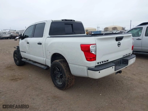 2019 Nissan Titan SV with VIN 1N6AA1E59KN530160, listed as a IAAI auction lot 41557126 with 128,594 mi miles. Bid and sale history available at carsss.com. Image 3.