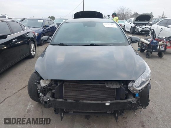 2021 Kia Forte GT-Line z VIN 3KPF34AD9ME316424, wystawiony jako IAAI lot #41467687 z przebiegiem 86 059 mil mil oraz . Historia ofert i sprzedaży dostępna na DreamBid. Obrazek 13.