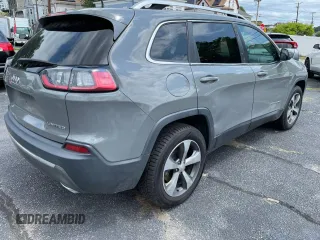 2020 Jeep Cherokee Limited with VIN 1C4PJMDXXLD562415, listed as a Copart auction lot 65097625 with 142,343 mi miles and Clean title. Bid and sale history available at DreamBid. Image 4.