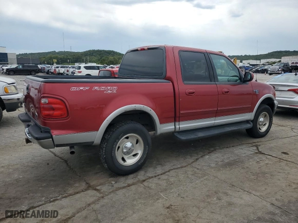 2001 Ford F-150 SuperCrew XLT with VIN 1FTRW08L81KA41003, listed as a Copart auction lot 72388534 with 319,211 mi miles and Salvage Title. Bid and sale history available at carsss.com. Image 3.
