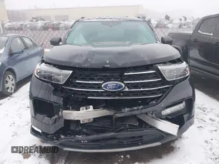 2021 Ford Explorer XLT with VIN 1FMSK8DH0MGA59737, listed as a IAAI auction lot 41474554 with 74,536 mi miles. Bid and sale history available at carsss.com. Image 12.