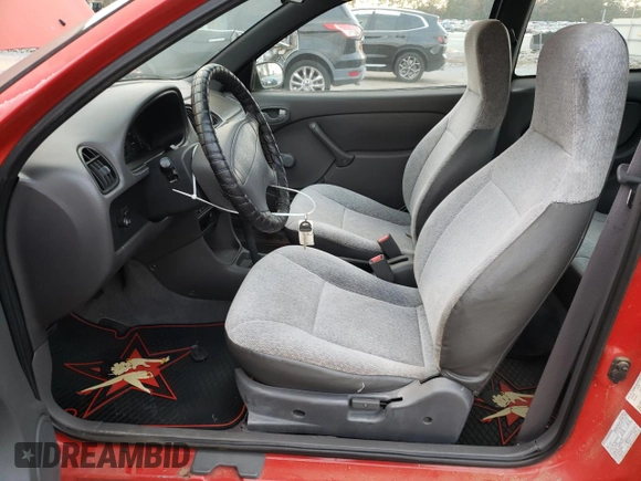 2001 Suzuki Swift GA z VIN 2S2AB21H216604405, wystawiony jako Copart lot #80427254 z przebiegiem 63 703 mil mil oraz Czysty tytuł • Clean title. Historia ofert i sprzedaży dostępna na DreamBid. Obrazek 7.