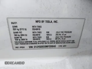 2021 Tesla Model Y Long Range with VIN 5YJYGDEE0MF209045, listed as a IAAI auction lot 41762738 with 24,721 mi miles. Bid and sale history available at carsss.com. Image 9.