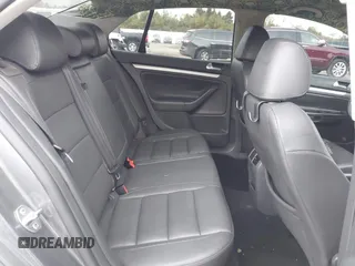 2008 Volkswagen Jetta SE z VIN 3VWRM71K18M135790, wystawiony jako IAAI lot #42165888 z przebiegiem 147 523 mil mil oraz . Historia ofert i sprzedaży dostępna na DreamBid. Obrazek 8.