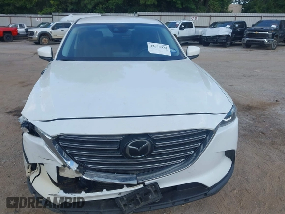 2018 Mazda CX-9 Touring with VIN JM3TCACY7J0222569, listed as a IAAI auction lot 42670932 with 130,644 mi miles and . Bid and sale history available at DreamBid. Image 12.