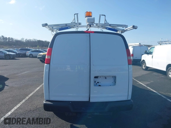 2015 Chevrolet Express Cargo with VIN 1GCWGFCF1F1161498, listed as a IAAI auction lot 41878871 with 157,365 mi miles. Bid and sale history available at carsss.com. Image 16.