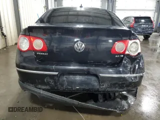 2010 Volkswagen Passat z VIN WVWJK9AN4AE096359, wystawiony jako Copart lot #50740075 z przebiegiem 196 126 mil mil oraz Szkoda całkowita • Salvage title. Historia ofert i sprzedaży dostępna na DreamBid. Obrazek 6.