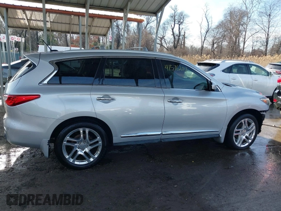 2013 Infiniti JX35 z VIN 5N1AL0MM3DC334693, wystawiony jako IAAI lot #41576207 z przebiegiem 113 677 mil mil oraz . Historia ofert i sprzedaży dostępna na DreamBid. Obrazek 13.